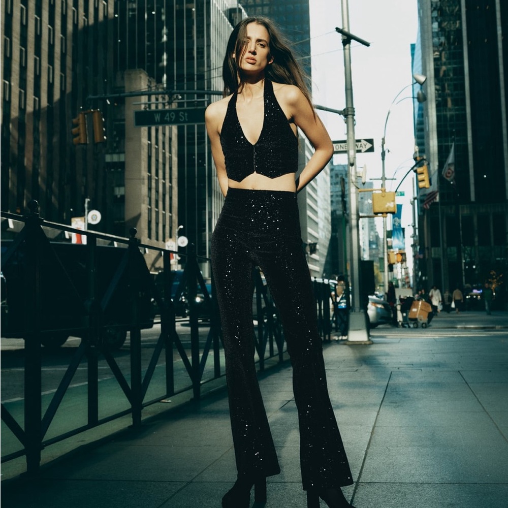 Black sequin flared pants from Zara. Perfect for holidays and NYE! Very comfy.